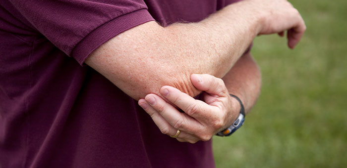 patient needing golfer's elbow treatment in Campbell